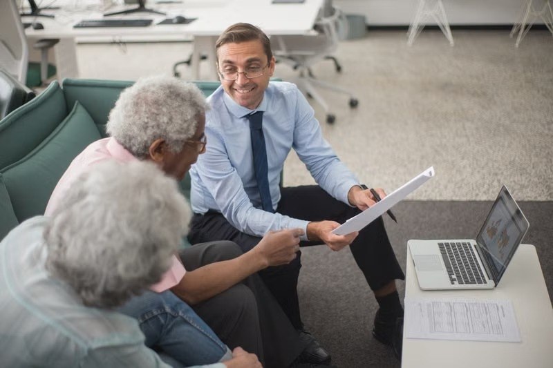 Advisor reviewing a plan with a senior couple